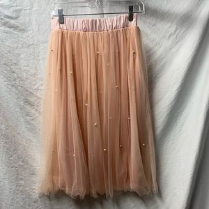 Light pink fun and lightweight skirt with Perl accents!